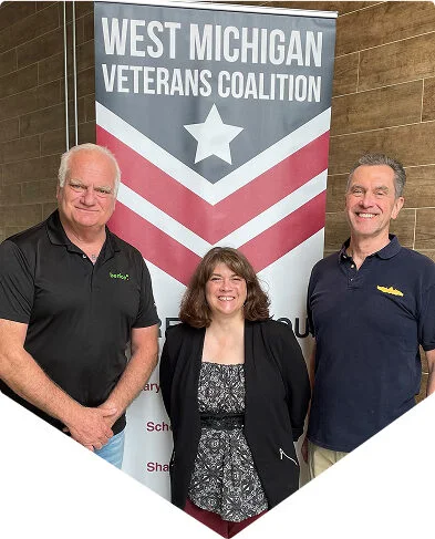 Eric Hipple with Deb Unseld and Paul Ryan